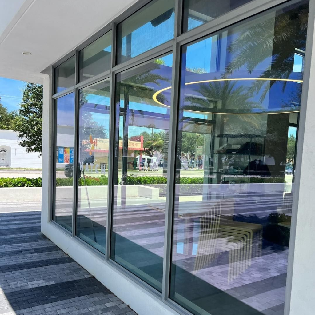 Commercial cleaning services with quality assurance for spotless and shiny commercial building glass in Brisbane and Adelaide.