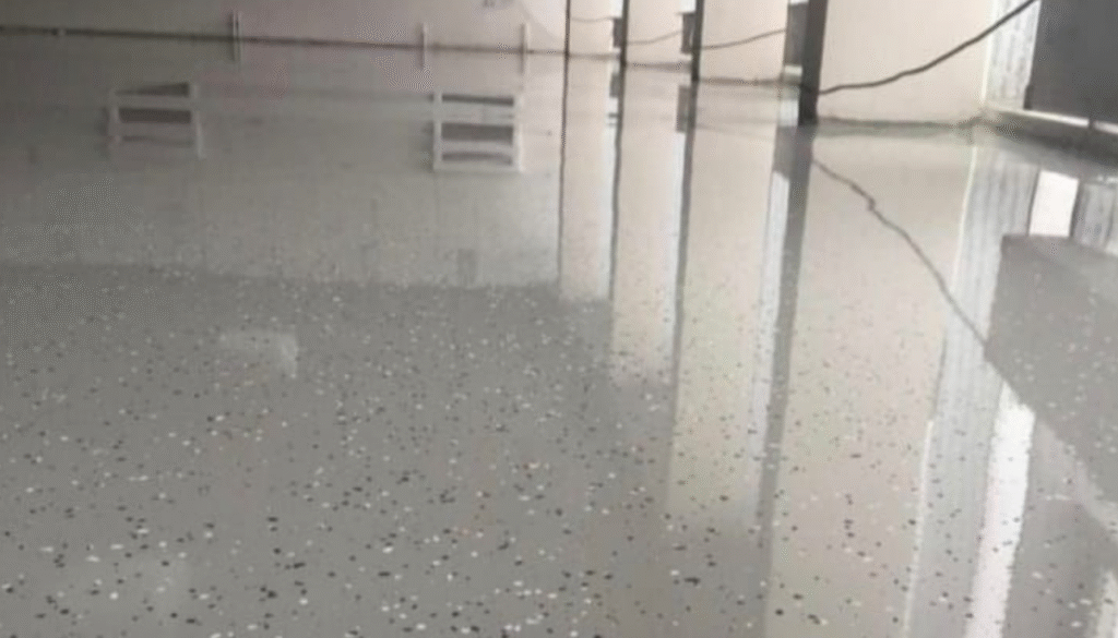 Vinyl Strip Cleaning and Sealing for industrial floors with protective coating.